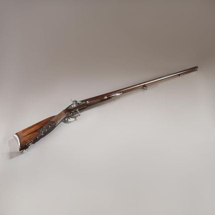 Double-barreled percussion hunting rifle.
Side-by-