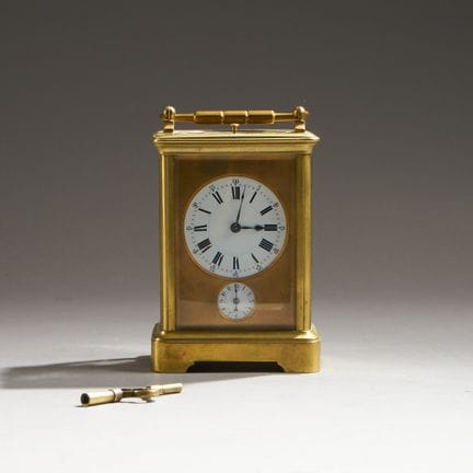 BREGUET.
Brass officer’s table clock.
The white en