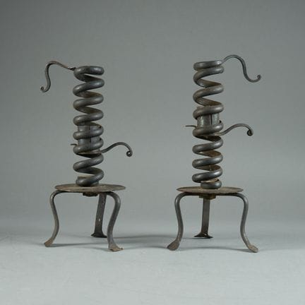 Pair of wrought-iron screw-type candlesticks known