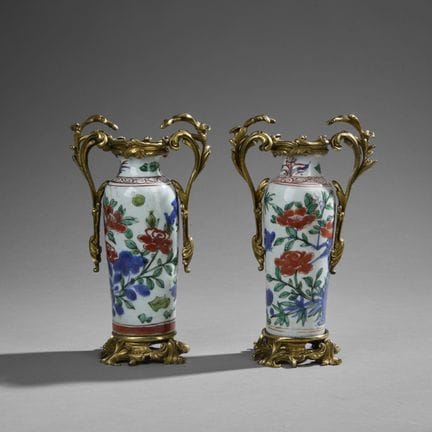 CHINA.
Pair of baluster vases in polychrome green,