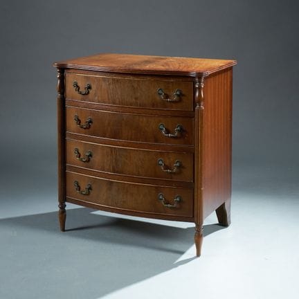 Small transitional-style chest of drawers with a s