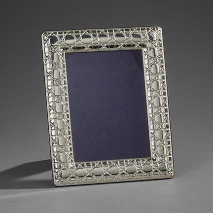 Christian DIOR.
Photo frame with a wooden frame co