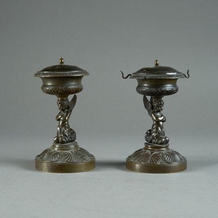 Pair of bronze watch displays or watch holders wit