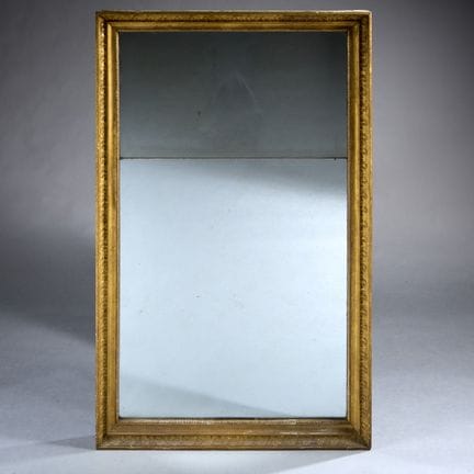 Rectangular mirror with a molded, carved wooden fr