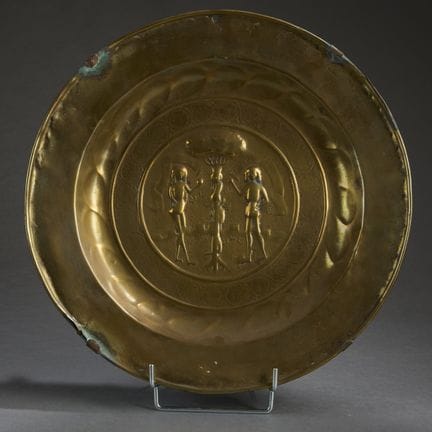 Stamped, repoussé, and engraved brass offering pla