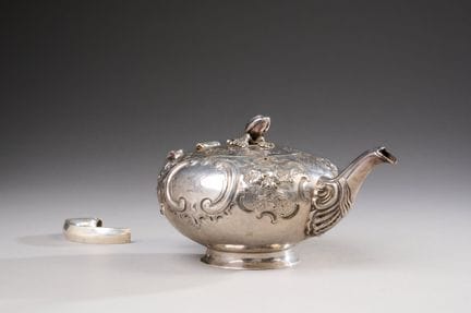 800-thousandths silver spherical teapot with embos
