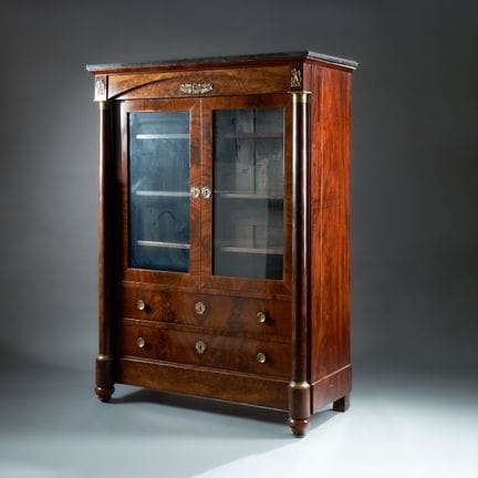 A large mahogany and mahogany-veneer cabinet (with