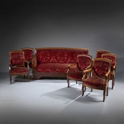 A set of six armchairs and a sofa made of mahogany