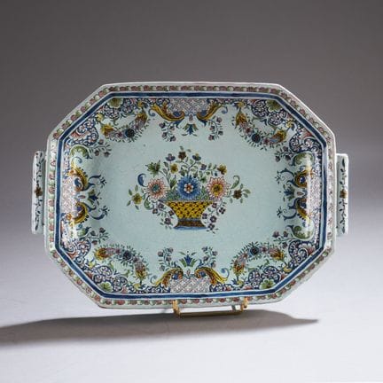 ROUEN.
Glazed earthenware tray with a polychrome d