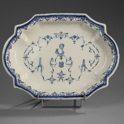 MOUSTIERS.
Oblong glazed earthenware dish with a s