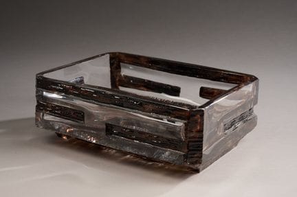 DAUM France.
Rectangular bowl in brown-tinted crys