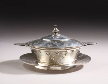 Ear-shaped soup tureen with a circular stand made 
