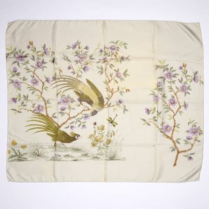 Silk scarf featuring a design of birds, flowers, a