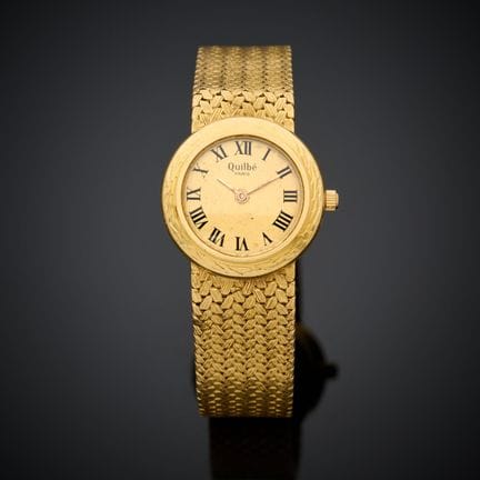 QUILBE. 
Montre de dame en or jaune 750 millièmes,