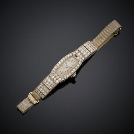 Montre de dame en platine 850 millièmes et or jaun