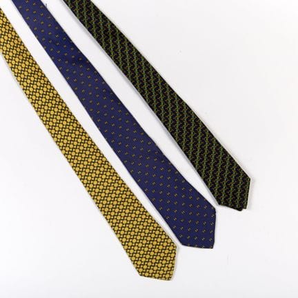 HERMÈS.
Set of three silk ties consisting of:
- on