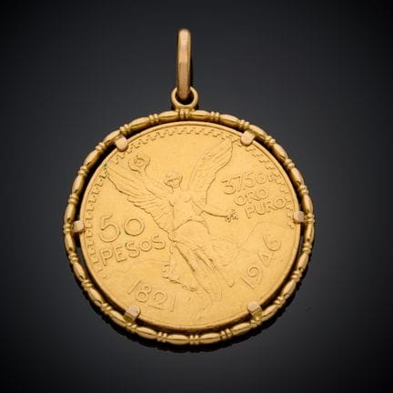 Pendentif en or 750 millièmes, serti d'une pièce e