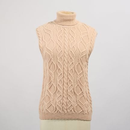 CHRISTIAN DIOR.
Top in lana rosa, dolcevita, senza
