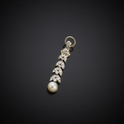 Un pendant d'oreille en or gris 750 millièmes et p