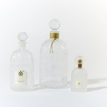 GUERLAIN.
Ensemble de trois flacons de parfum en v