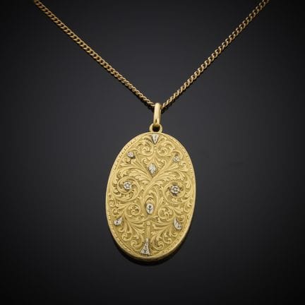 Pendentif porte-photo en or jaune et gris 750 mill