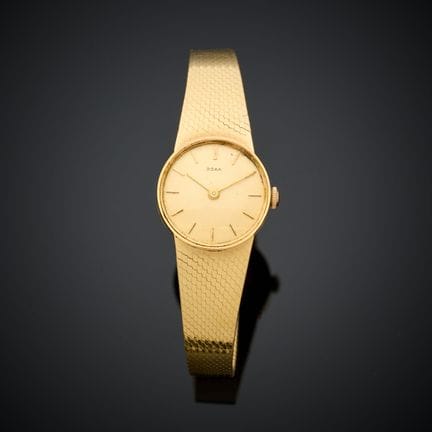DOXA.
Montre bracelet de dame en or jaune 750 mill