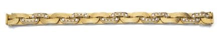 Bracelet
L. 19 cm / l. 1,0 cm

Or jaune 750/000 (p