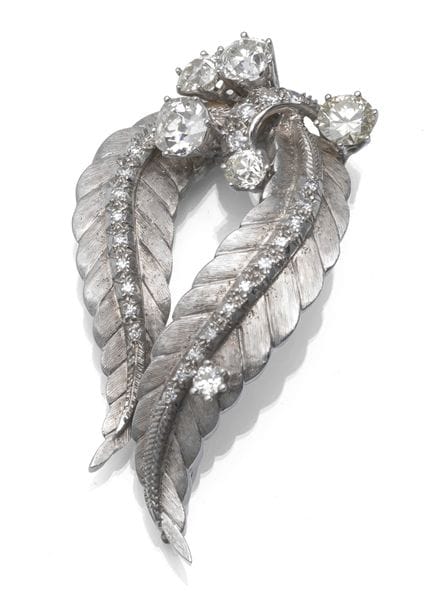 Brosch/Anhänger
3,0 x 5,5 cm

750/000 Weißgold (ge