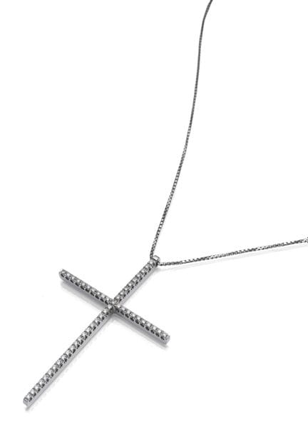 Cruz de brillantes con cadena
3,7 x 5,8 cm | L. 44