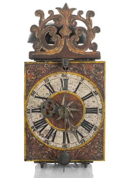 Horloge murale en fer avec cadran en fer peint
Sud
