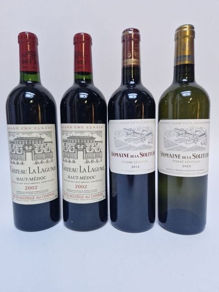 Lote de cuatro botellas de vino de Burdeos:
- 2 bo
