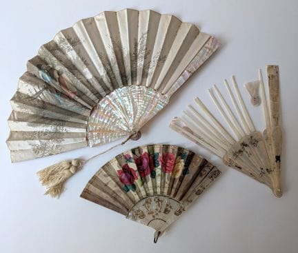A set of three fans consisting of: 
- A folding fa