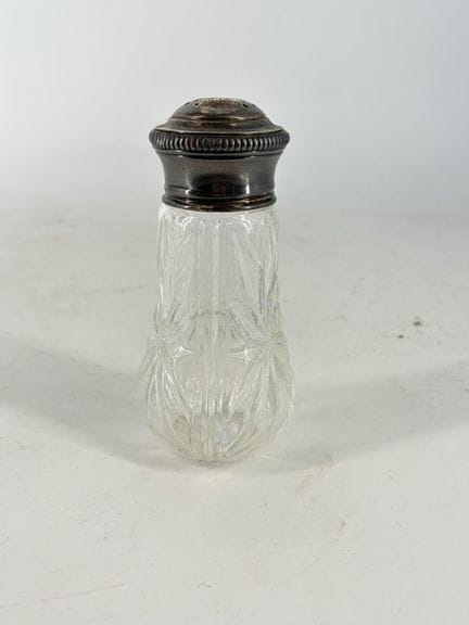 Spolverino in vetro con montatura in argento 950. 