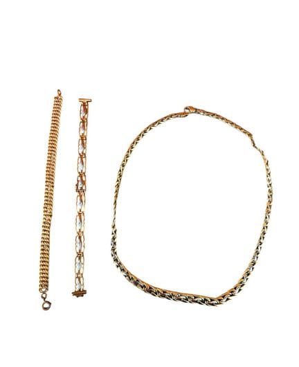 Lote de tres cadenas de oro blanco y amarillo de 1