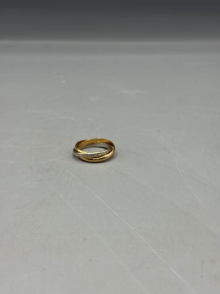 Alianza de tres anillos en tres tonos de oro de 18