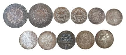 Lote de monedas de plata compuesto por:

- dos mon
