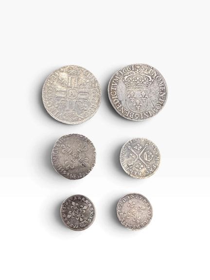 Conjunto de monedas reales que incluye, entre otra