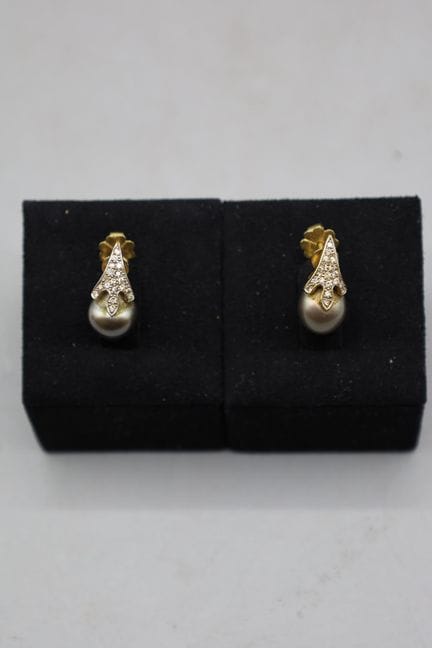 ACDC 
Par de pendientes de oro amarillo de 18 quil