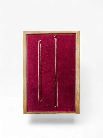 Dos cadenas de oro amarillo de 18 quilates (750 mi