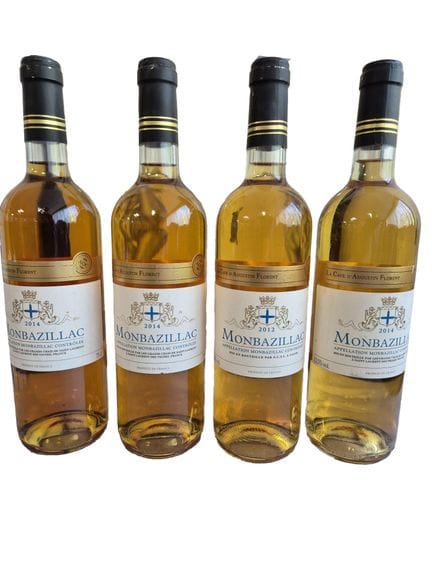Lote de cuatro botellas de MONBAZILLAC, tres de 20