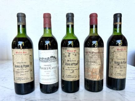 Trois bouteilles de Château Graves de Pignon Pomer