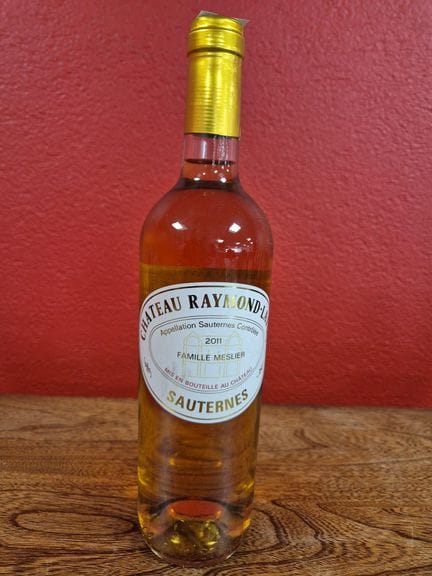 Una botella de Château RAYMOND-LAFON Sauternes (fa