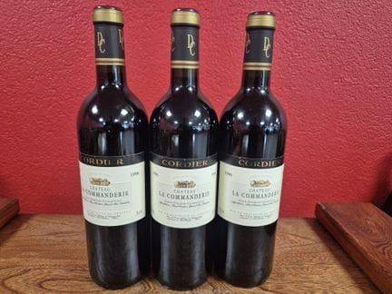 Trois bouteilles de Château La Commanderie St Emil