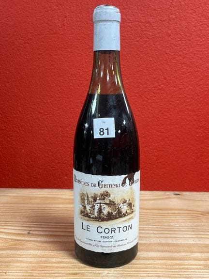 Una botella de Château de Beaune Le Corton, añada 