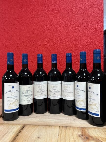 Lot de 7 bouteilles :
Trois bouteilles Château Fle