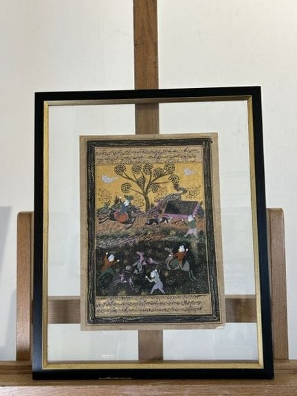 Folio de manuscrit illustré d'une scène de chasse,