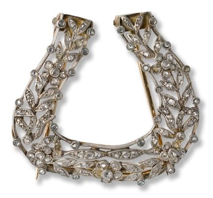 Diamond brooch
c. 1900
silver on gold, rose cut di