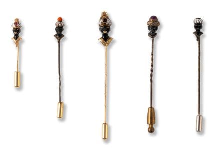 Five Moretti head pins
early 20th century
silver a