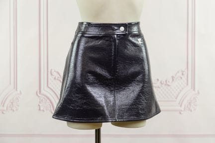 COURREGES - Mini jupe réédition en vinyle "denim",