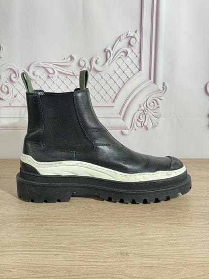 DIOR x SACAI - Paire de bottines "Explorer", cuir 